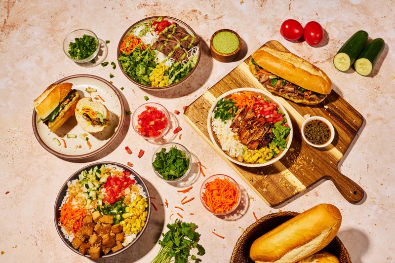 Vietnamese restaurant brand identity and website case study featuring complete brand kit, menu board design, and custom website